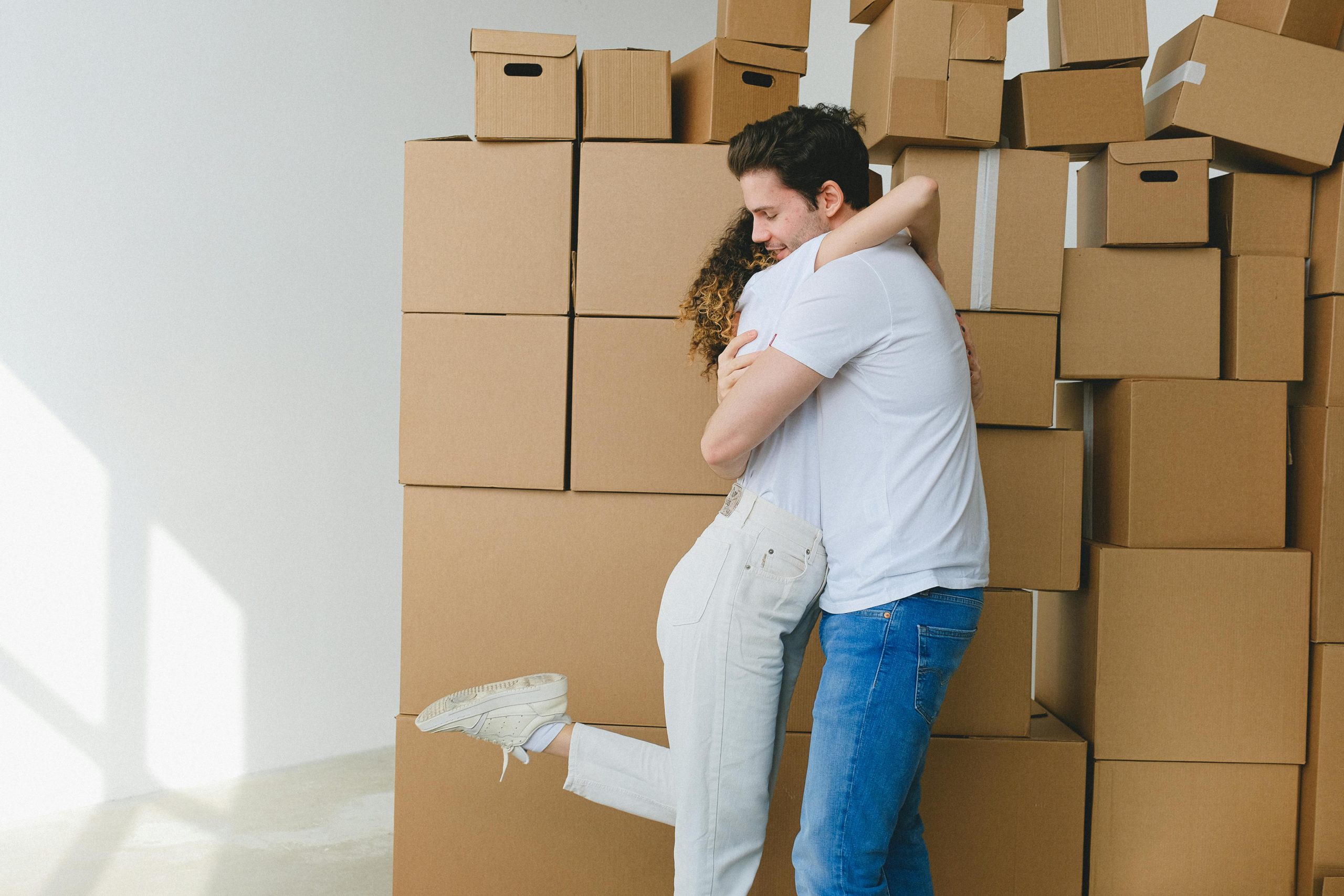 Excited couple ready for a big move.